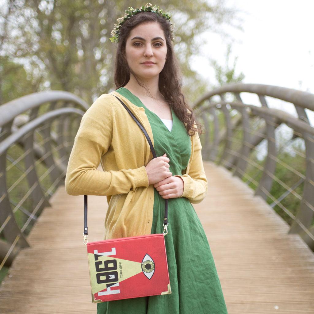 1988 Red and Yellow Handbag by George Orwell featuring Big Brother Eye design, by Well Read Co. - Model in Green