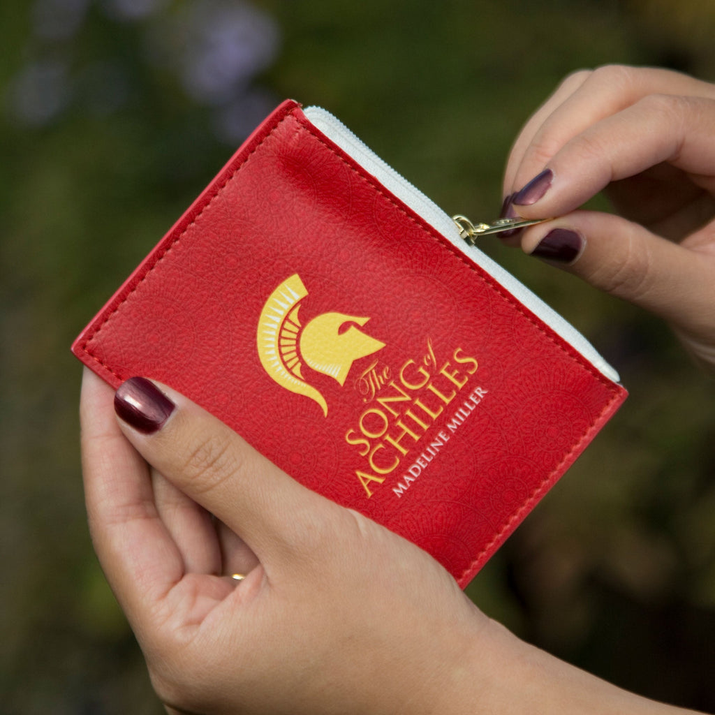 The Song of Achilles Red Coin Purse by Madeline Miller featuring Gold Trojan Helmet design, by Well Read Co - Hand