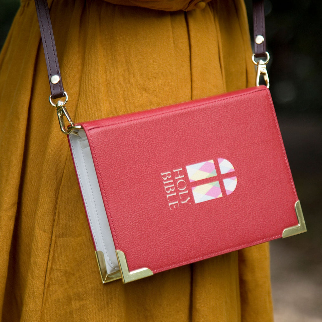 The Holy Bible Red Handbag by Well Read Co. featuring Stained-Glass Window design - Model with bag