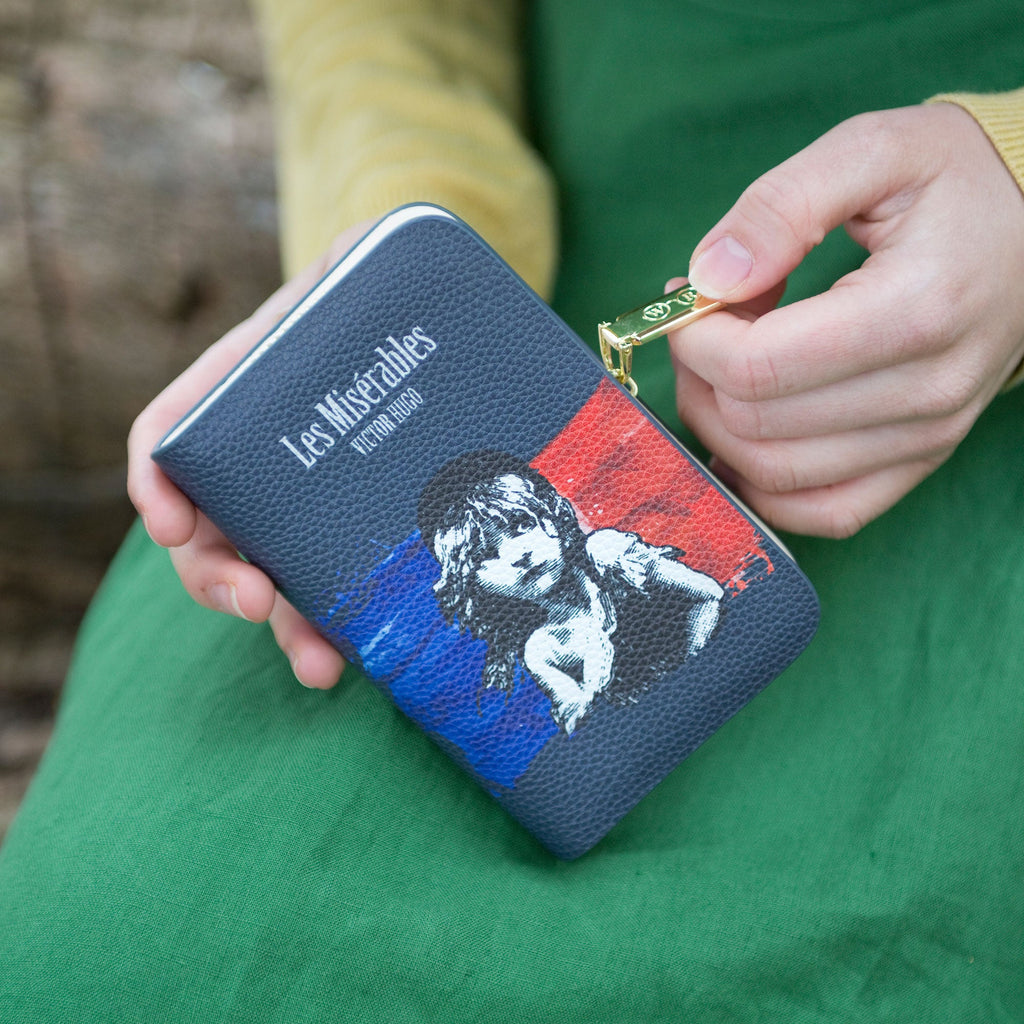 Les Misérables Blue Zip Around Wallet by Victor Hugo featuring Cosette against French flag design, by Well Read Co. - Hand