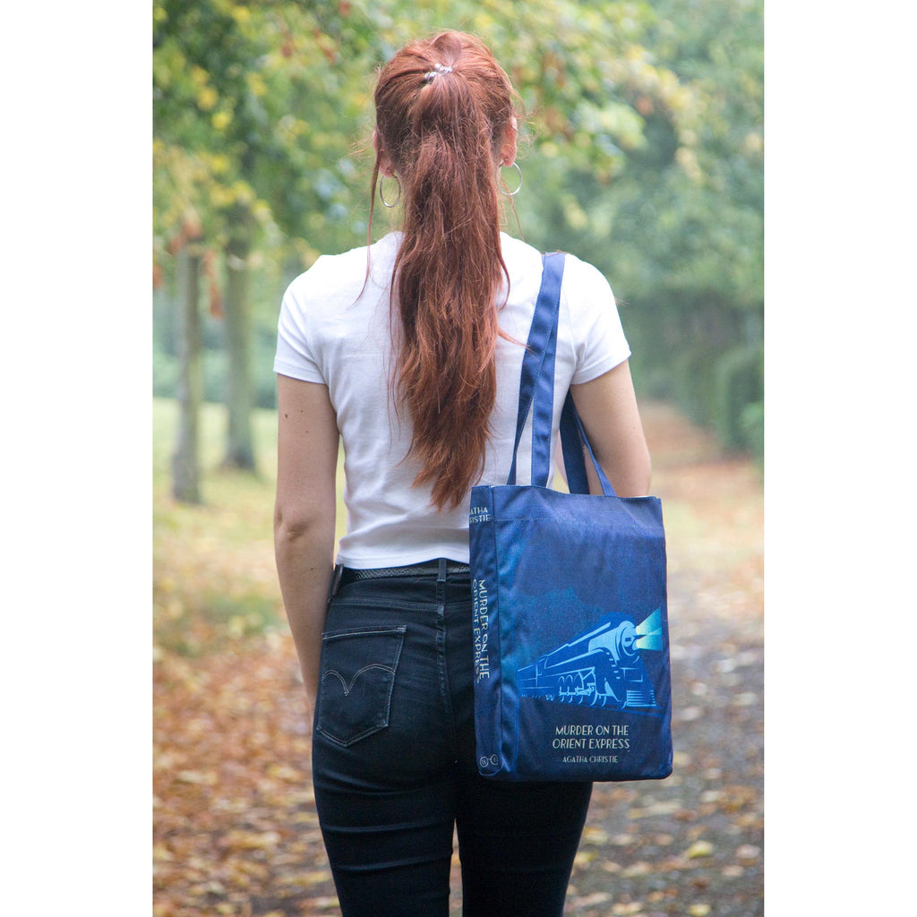 The Murder on the Orient Express Blue Tote Bag by Agatha Christie featuring Steam Train design, by Well Read Co. - Model Back Side