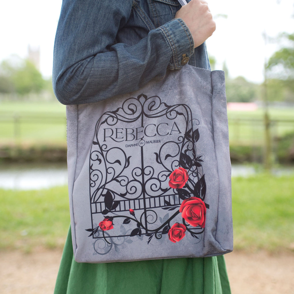 Rebecca Grey Tote Bag by Daphne du Maurier featuring Ornate Gate covered in Roses design, by Well Read Co. - Model with bag
