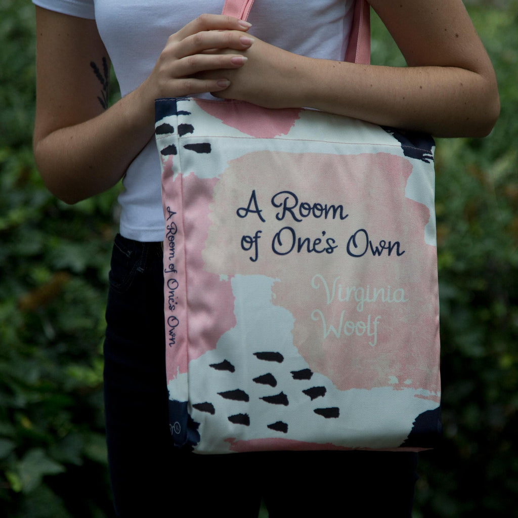 A Room of One's Own Pink and Blue Tote Bag by Virginia Woolf featuring Paint Splotches design, by Well Read Co. - Model Standing
