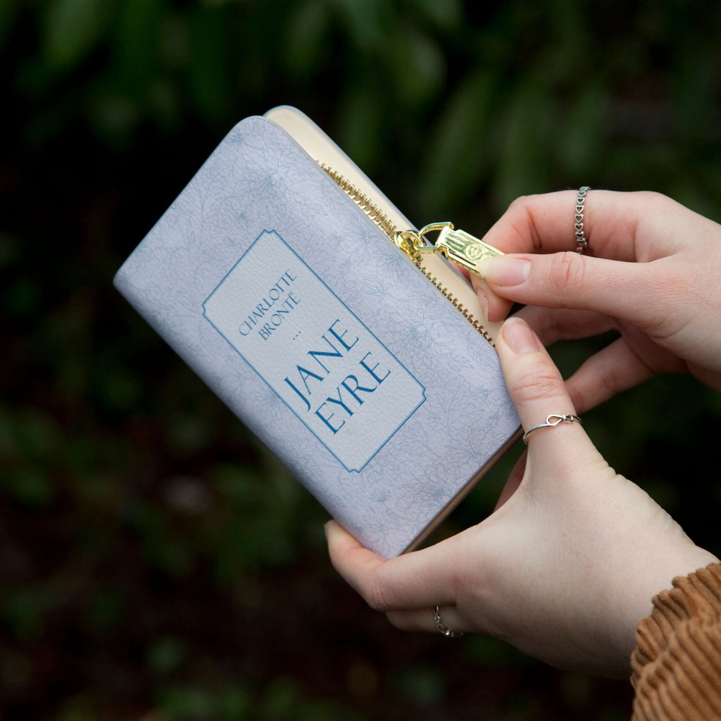 Jane Eyre Lilac Wallet Purse by Charlotte Brontë with Flowery design, by Well Read Co. - Hands